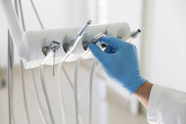 Professional Tooth Extraction technician working in James City, NC